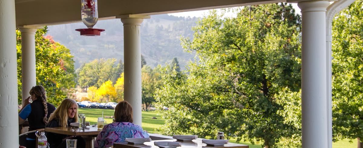 People dining on the patio at Chautauqua Dining Hall in Boulder