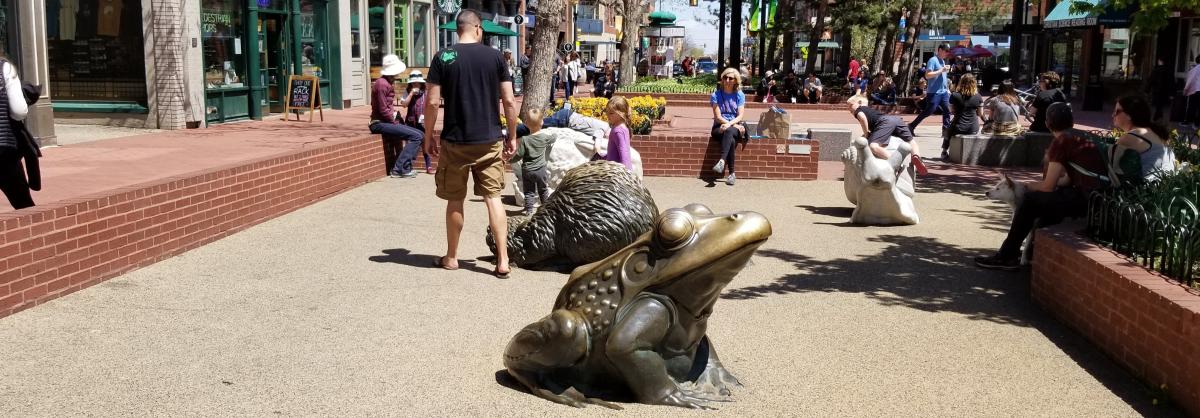 Families and visitors enjoy the animal sculptures along Boulder's famous Pearl Street.